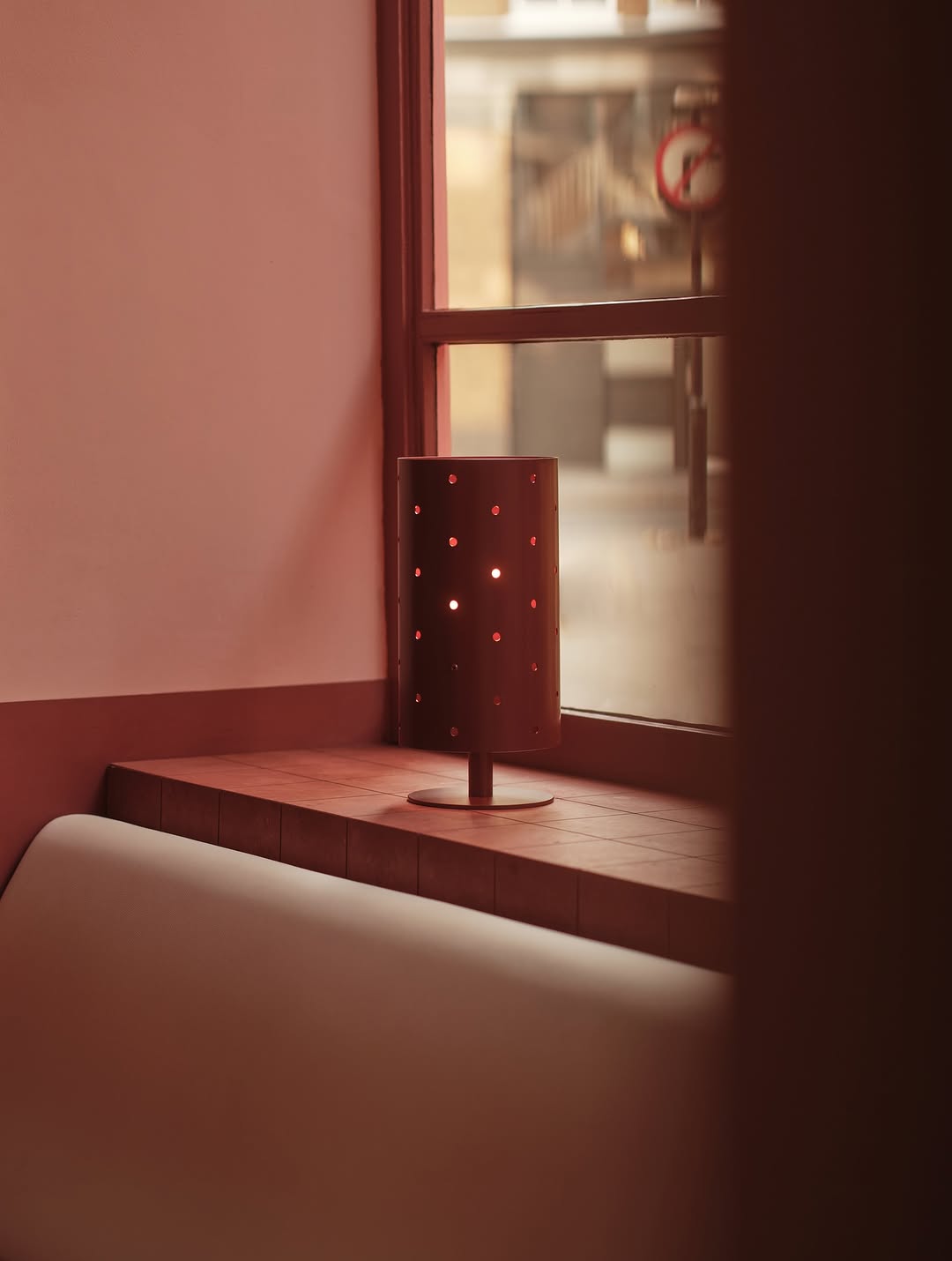 Lamp with metal perforated shade by Eddie Olin