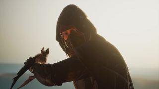 Dune: Awakening silicone blocks - A character wearing a Stillsuit turned slightly as a bat-like creature lands on their arm.