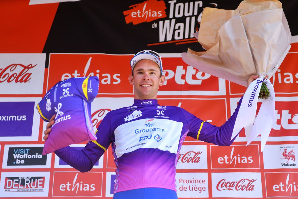 HERVE BELGIUM JULY 24 Fabian Lienhard of Switzerland and Team Groupama FDJ celebrates winning the Purple Intermediated Sprint Jersey on the podium ceremony after the 43rd Ethias Tour de Wallonie 2022 Stage 2 a 1768km stage from Verviers to Herve 274m ethiastourdewallonie22 on July 24 2022 in Herve Belgium Photo by Luc ClaessenGetty Images