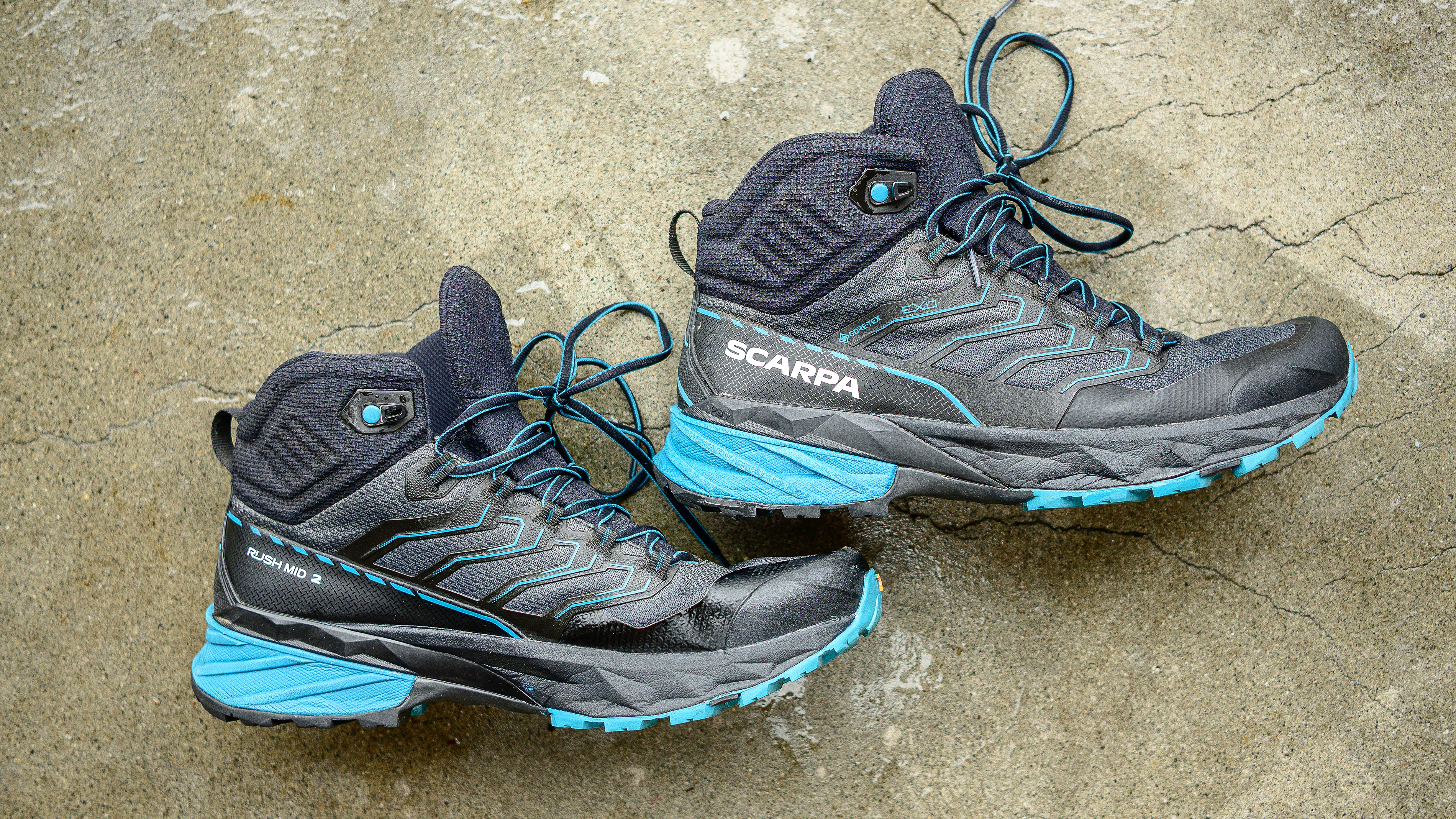 Scarpa Rush 2 Mid GTX hiking boots laying on the floor