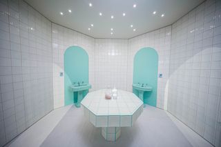 Nada Debs Kohler Hammam installation at Design Miami 2022 featuring blue and green tiles