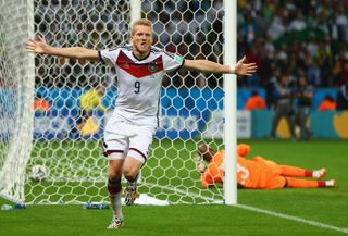 Andre Schurrle scores for Germany against Algeria at the 2014 World Cup.