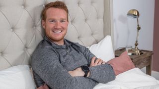 Olympic athlete Greg Rutherford lies on a Dreams Team GB mattress