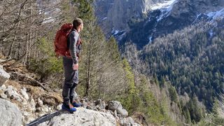 Alex hiking in the Dolomites with Osprey Kestrel 38 backpack