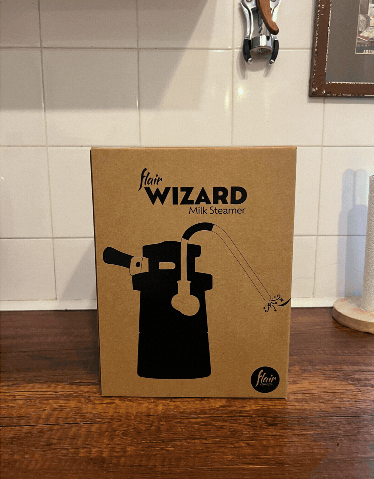 GIF of three images showing a Flair Wizard stovetop steamer in the box, then unboxed, then set up on a wooden countertop.