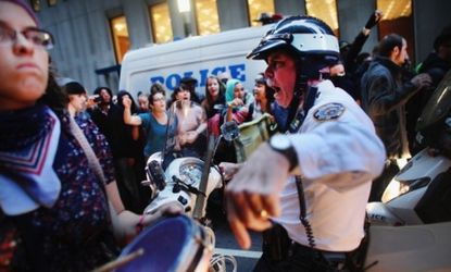 New York City police and Occupy Wall Street protesters face off: One conspiracy theory about OWS suggests that New York cops are being paid off by big banks.