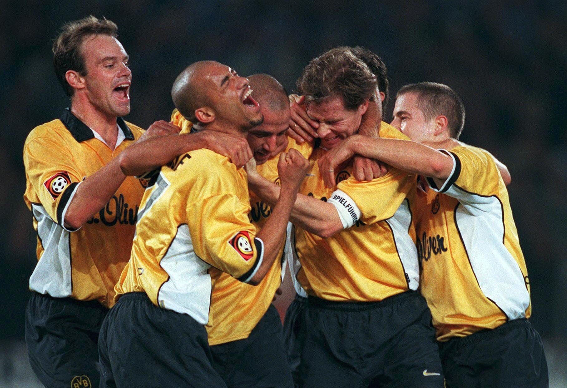 Borussia Dortmund players celebrate a goal against Arminia Bielefeld in October 1999.