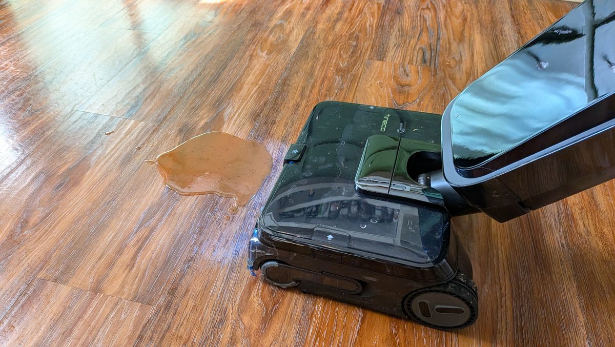 Tineco Floor ONE Station S9 Scientist Pro wet and dry vacuum cleaner cleaning up wet spill