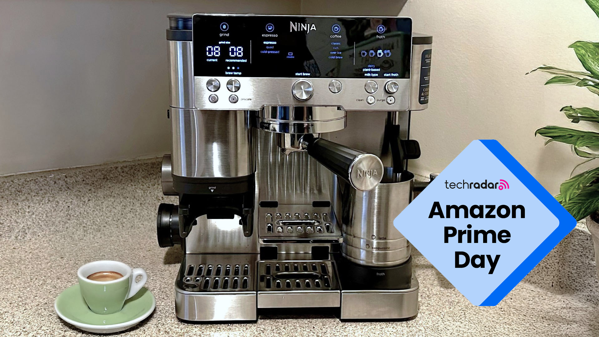 Ninja Luxe Cafe Premier espresso machine in stainless steel on a kitchen counter, with an Amazon Prime Day badge in the bottom right.