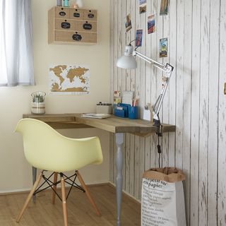 study room with wooden floor and study lamp on wooden desk