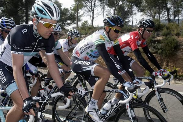 Giacomo Nizzolo (Leopard Trek) rides next to Saxo Bank teammates Alberto Contador and Nicki S&ouml;rensen.