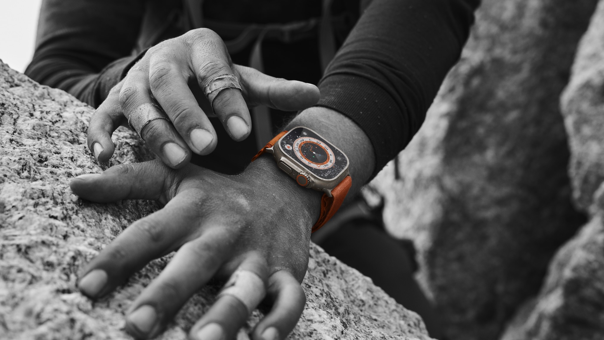 Apple Watch Ultra close-up on a hiker's hands.