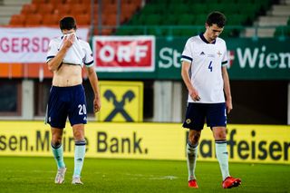Northern Ireland’s Craig Cathcart (left) and Tom Flanagan reflect on another painful defeat