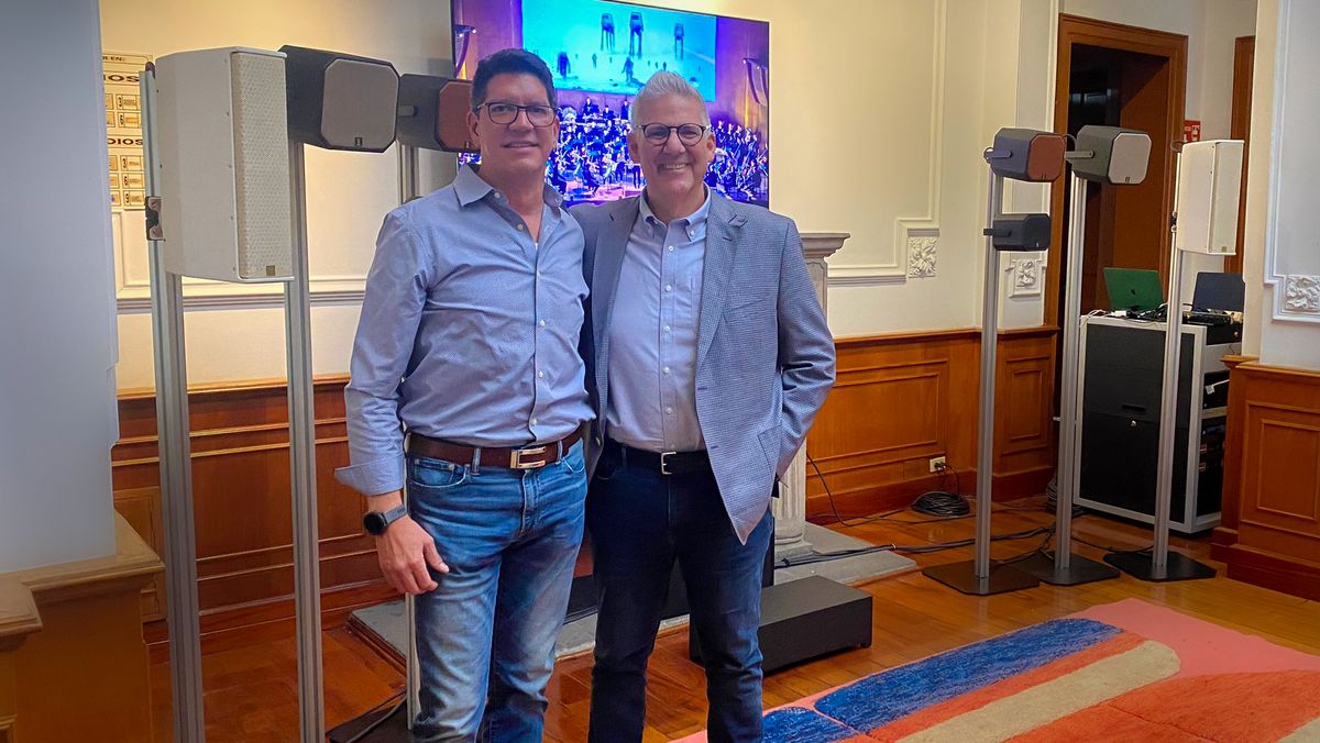 1 SOUND opens a new partnership in Mexico as both CEO&#039;s pose smiling in front of their loudspeakers. 