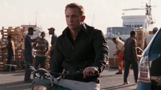 Daniel Craig waits patiently on his motorcycle in Quantum of Solace.