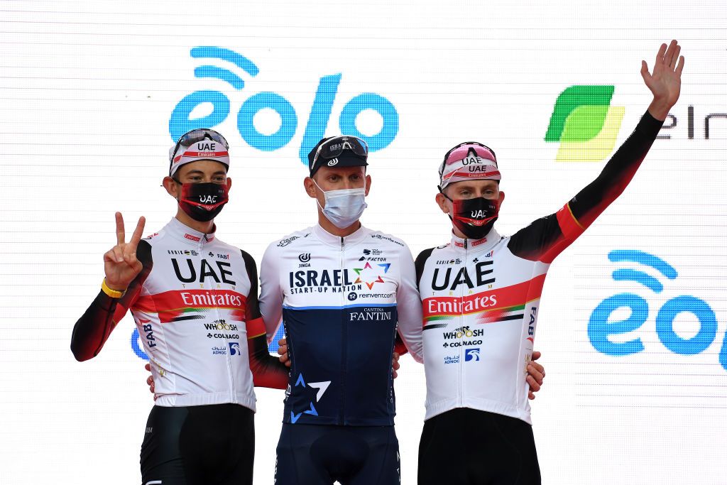 VARESE ITALY OCTOBER 05 LR Davide Formolo of Italy and UAE Team Emirates on second place stage winner Alessandro De Marchi of Italy and Team Israel StartUp Nation and Tadej Pogacar of Slovenia and UAE Team Emirates on third place celebrate on the podium during the podium ceremony after the 100th Tre Valli Varesine a 1967km race from Busto Arsizio to Varese 377m AlfredoBindaVa on October 05 2021 in Varese Italy Photo by Tim de WaeleGetty Images