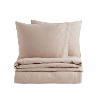 A light pink bedding set