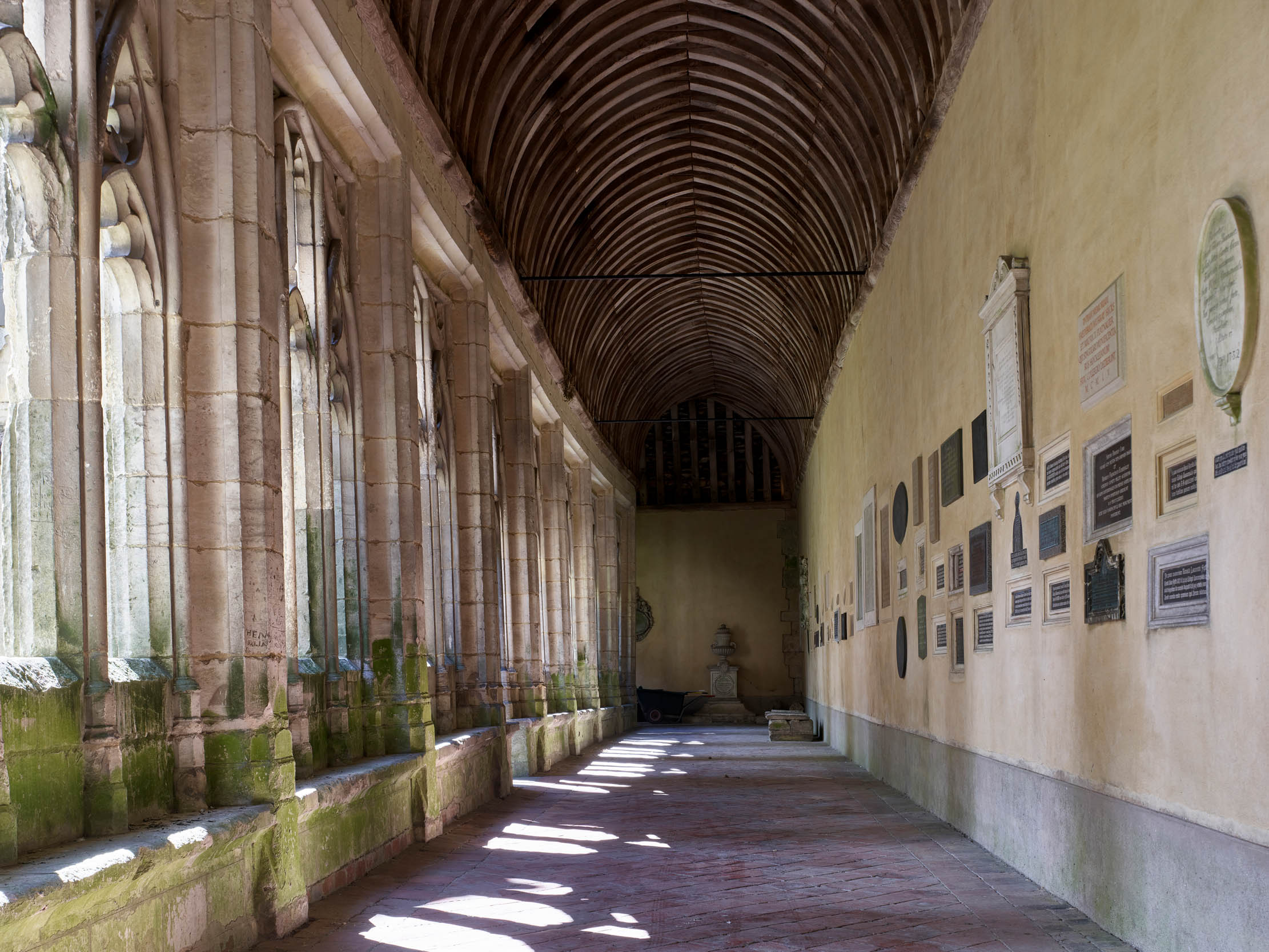 Fig 6: The cloister walks display monuments to Wykehamists. Winchester College, Hampshire. Photographed by Paul Highnam for Country Life.