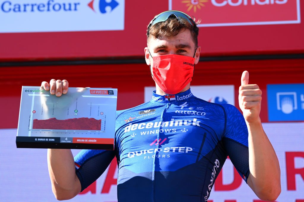 MOLINA DE ARAGON SPAIN AUGUST 17 Fabio Jakobsen of Netherlands and Team Deceuninck QuickStep celebrates winning the stage on the podium ceremony after the 76th Tour of Spain 2021 Stage 4 a 1639km stage from El Burgo de Osma to Molina de Aragn 1134m lavuelta LaVuelta21 on August 17 2021 in Molina de Aragn Spain Photo by Stuart FranklinGetty Images