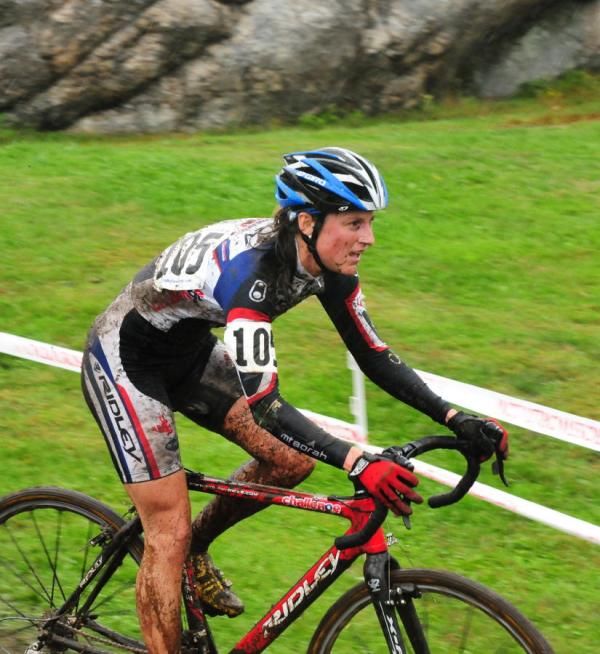 Rebecca Wellons (Team Plan C) riding on the grass
