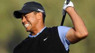 Tiger Woods winces in pain during the 2008 US Open