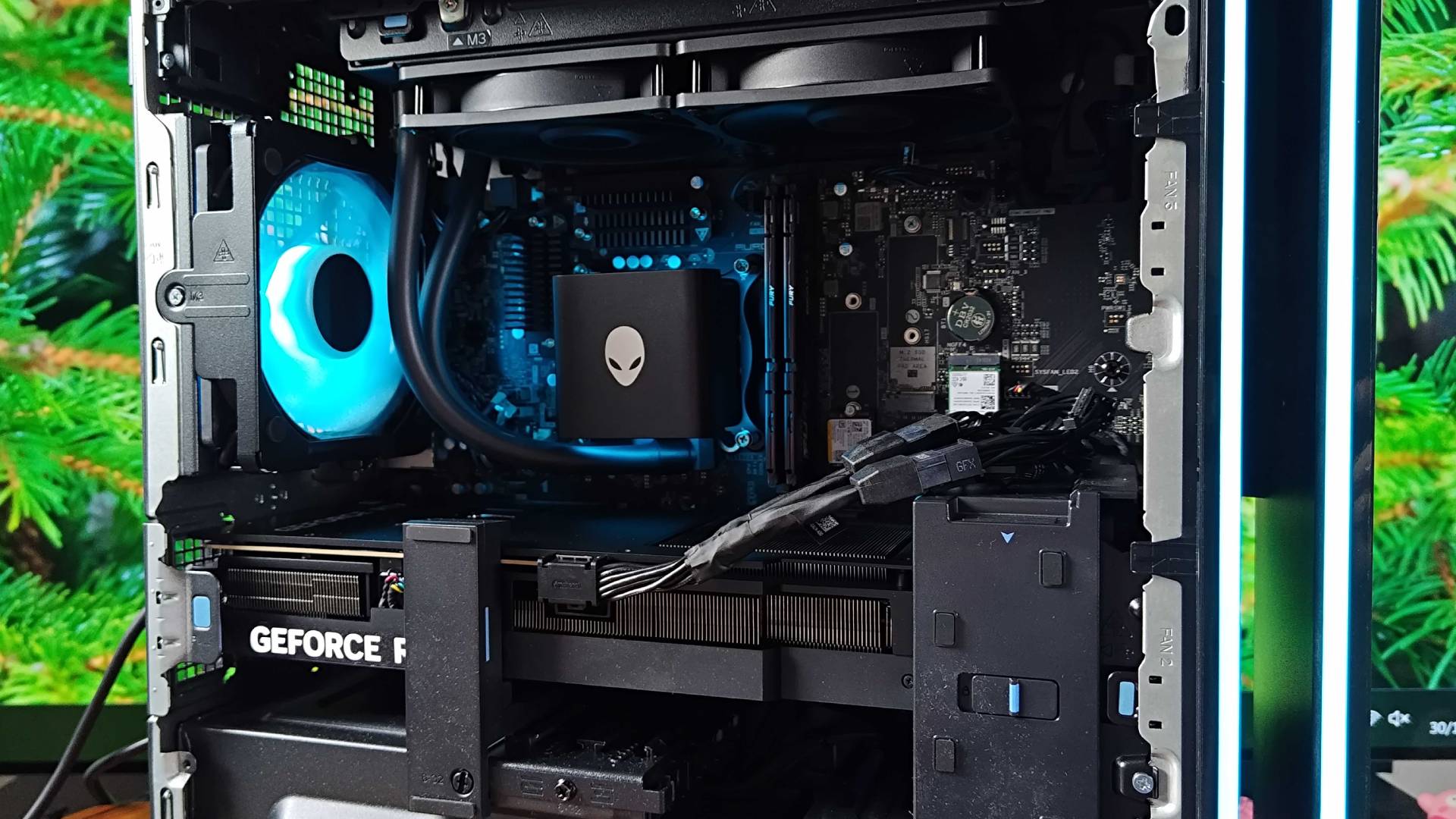 Alienware Aurora view of inside with GPU and AIO cooler in view.