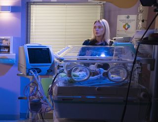 A visitor surprises Lauren at the hospital.