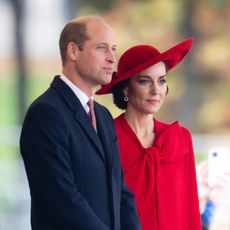 Kate Middleton wears a red dress and a matching hat while Prince William wears a suit, and Prince Andrew leaves church on Easter Sunday 2025