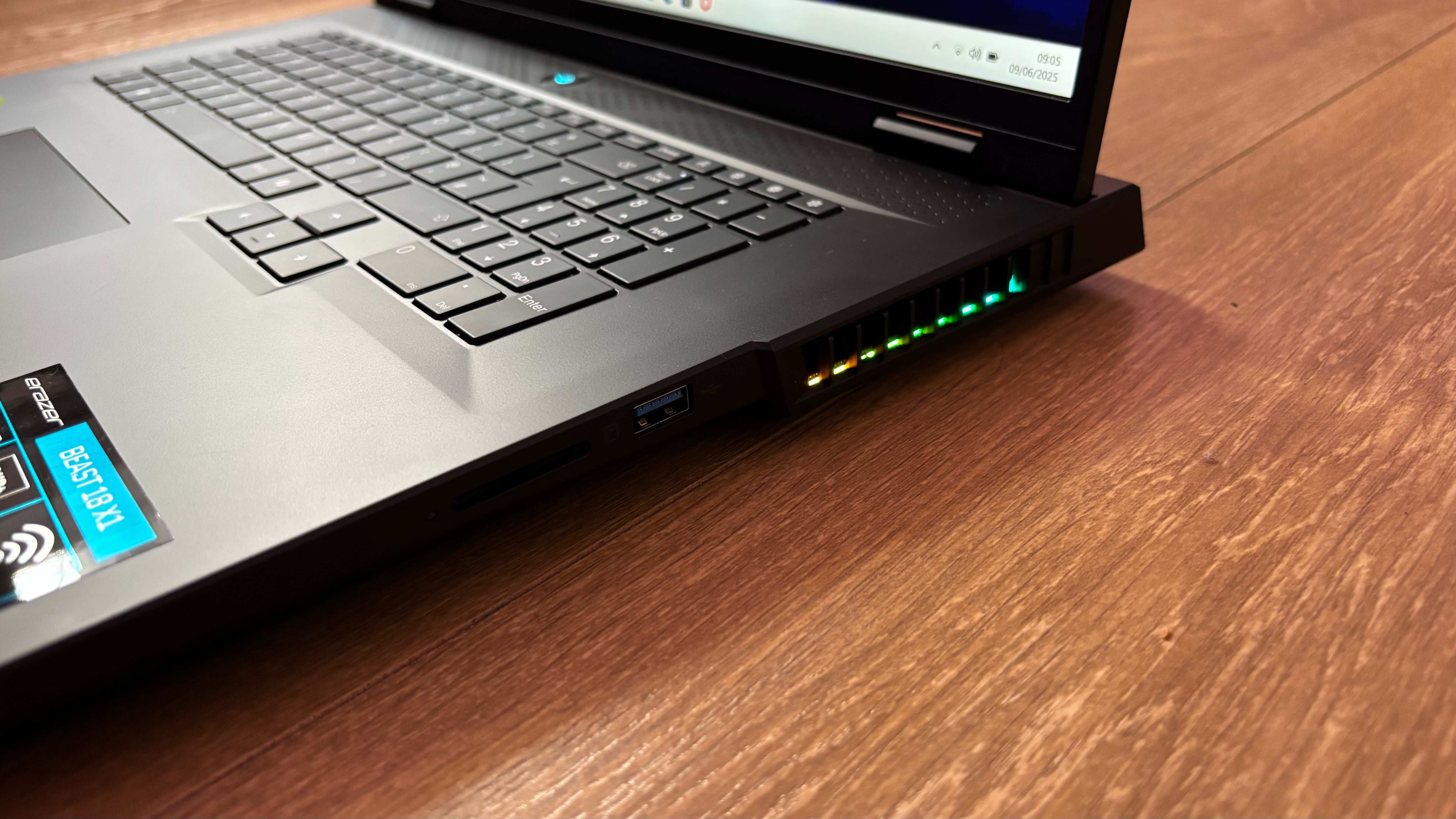 Medion Erazer Beast 18 gaming laptop on wooden floor