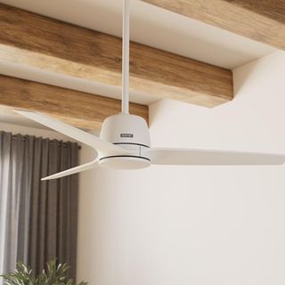 A white ceiling fan with three blades