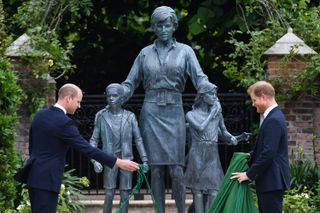 Prince William and Prince Harry unveiling the statue of Princess Diana in the Sunken Garden at Kensington Palace