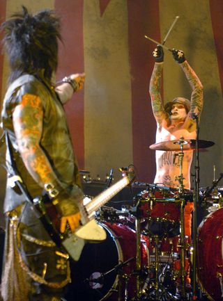 Nikki Sixx and Tommy Lee onstage, 2005