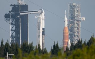 A zoomed-in view of the Artemis 1 stack (at right) and Ax-1 Falcon 9 and Dragon at KSC on April 6, 2022.