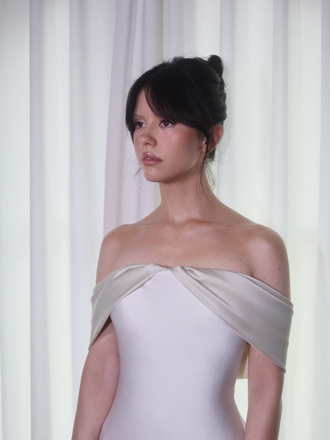 Mia Goth with french bun