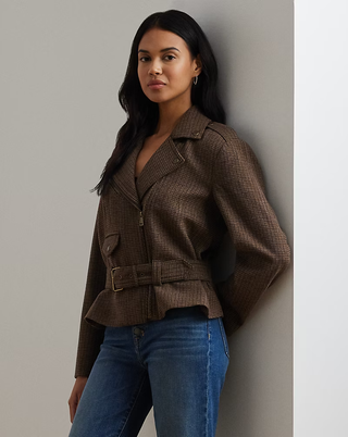 A model wearing a brown tweed moto jacket