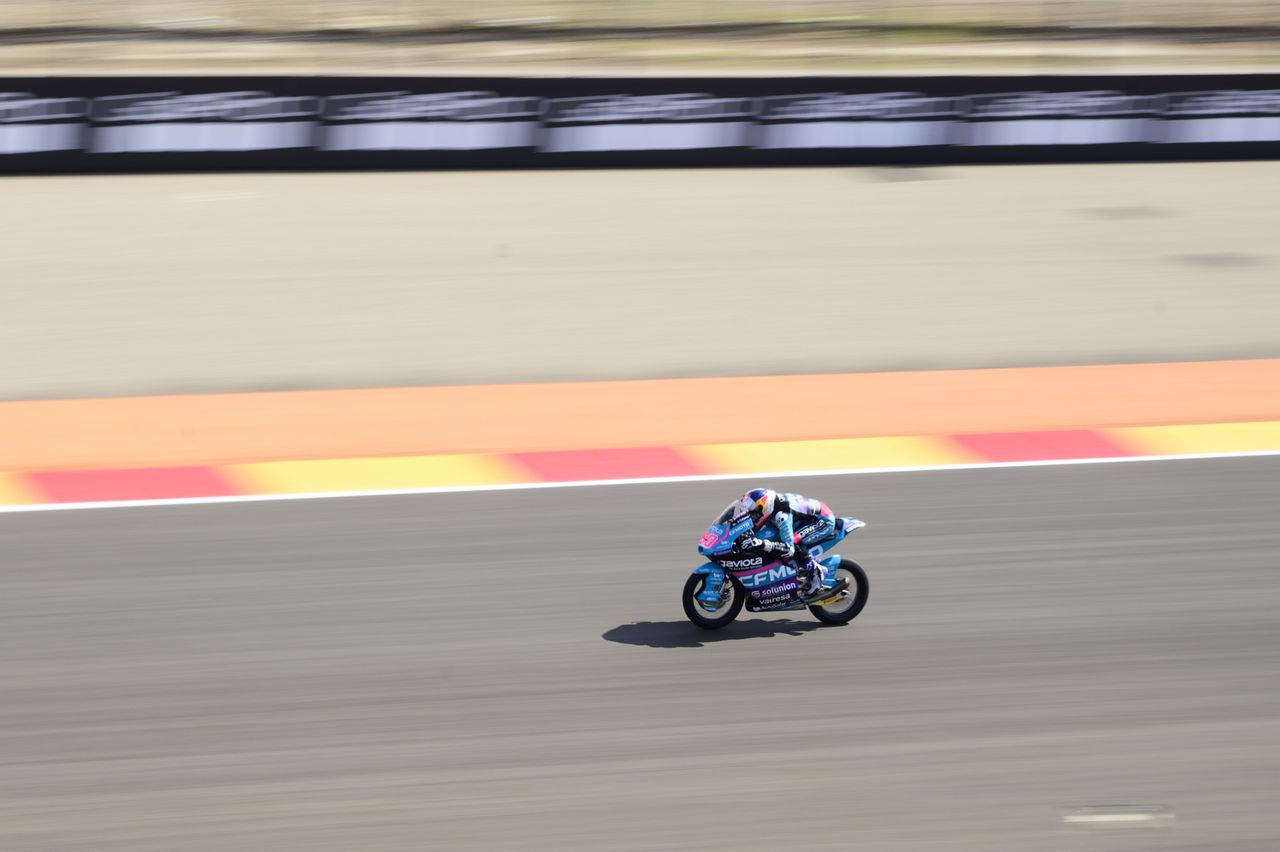 MotoGP racetrack with motorbike riders at full speed