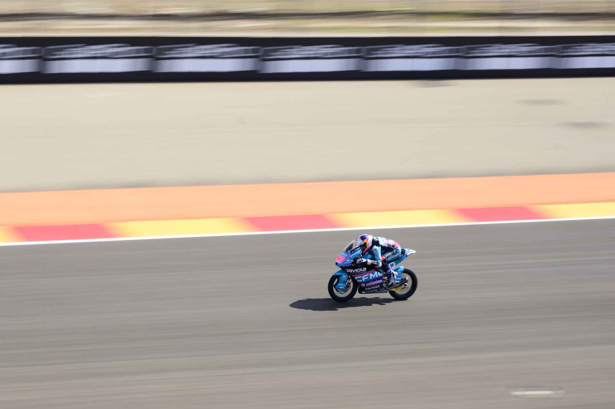 MotoGP racetrack with motorbike riders at full speed