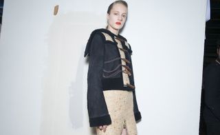 Model light skirt with patterns, winter jacket, nose accessories