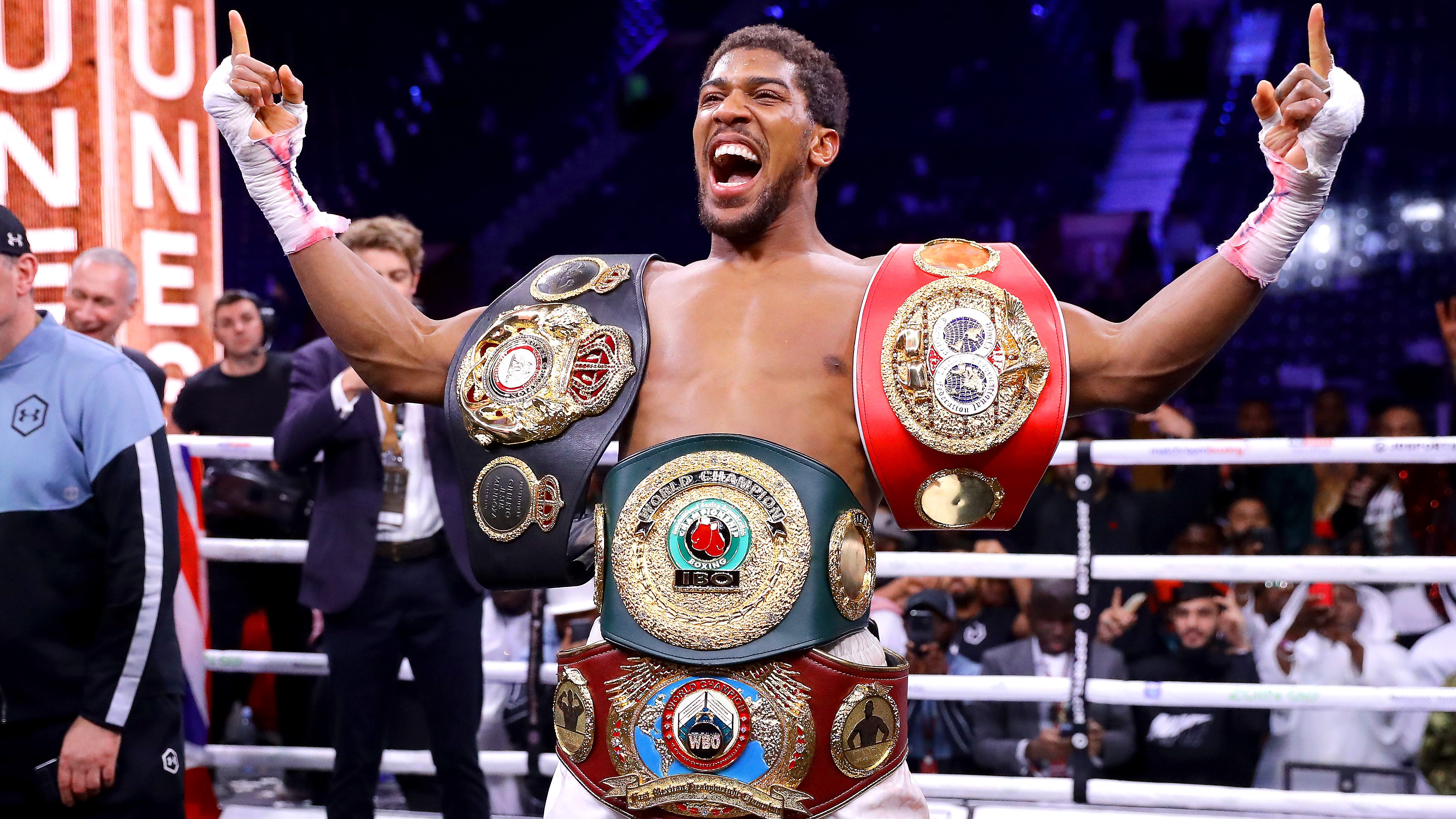 anthony joshua with title belts