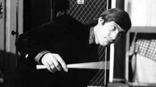 Charlie Watts playing drums on the set of Ready Steady Go! TV Show at Television House, London, 26th June 1964.