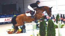British showjumper Antonia Platt and Marvin Van De Waterhoeve in action in the World Cup leg of Verona