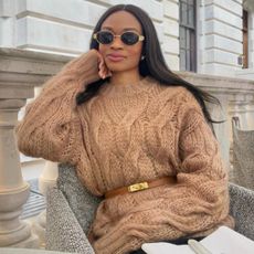 Influencer wears a camel jumper