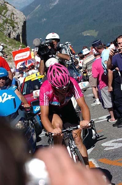 The German is cheered on by many spectators as he is approaching the summit.