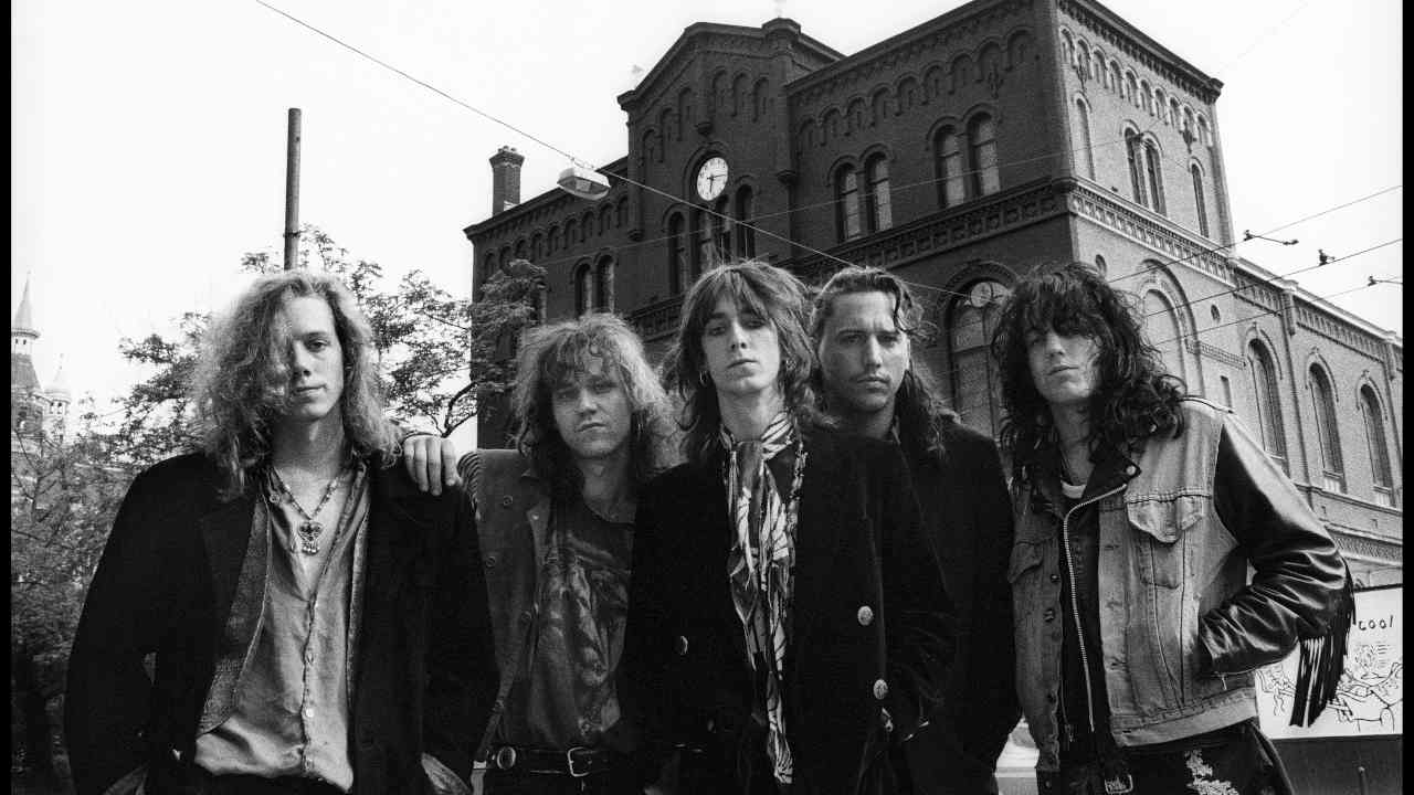 The Black Crowes posing for a photograph in 1990