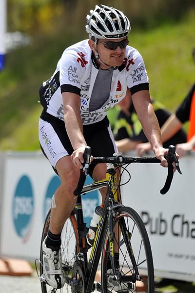 Floyd Landis looks relaxed as he crosses the finish line at the end of stage six