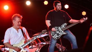 Eddie Van Halen (left) and Wolfgang Van Halen perform live in 2015