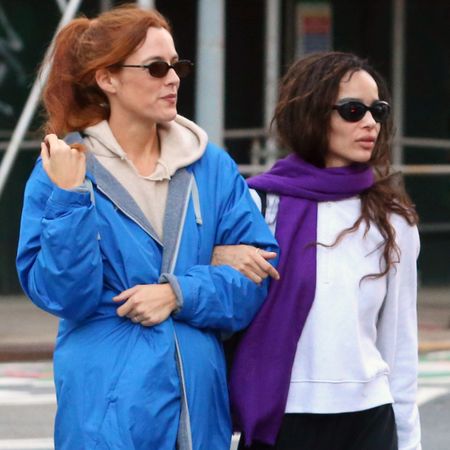 Zo&euml; Kravitz styled Ugg slippers with her signature purple scarf in NYC with Riley Keough