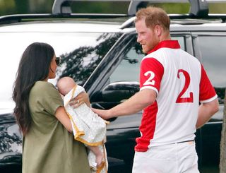 Prince Harry, Meghan Markle and Prince Archie attend the polo