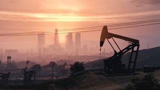 Oil derrick near sweltering city skyline