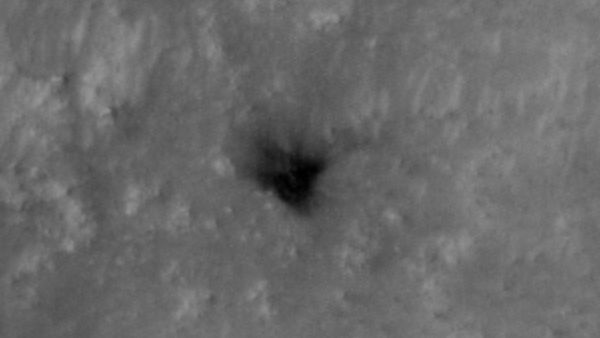 During entry and descent through the Martian atmosphere, Perseverance was protected by a heat shield, which endured peak heating of 2,370 degrees Fahrenheit (about 1,300 degrees Celsius). Soon after Perseverance deployed its parachute, the heat shield separated and dropped away from the spacecraft, exposing the rover to Mars&rsquo; atmosphere for the first time. This image, taken on Feb. 19 by the High Resolution Imaging Experiment (HiRISE) camera aboard the Mars Reconnaissance Orbiter, captures an up-close view of the heat shield&rsquo;s final landing spot, safely away from the Perseverance rover.